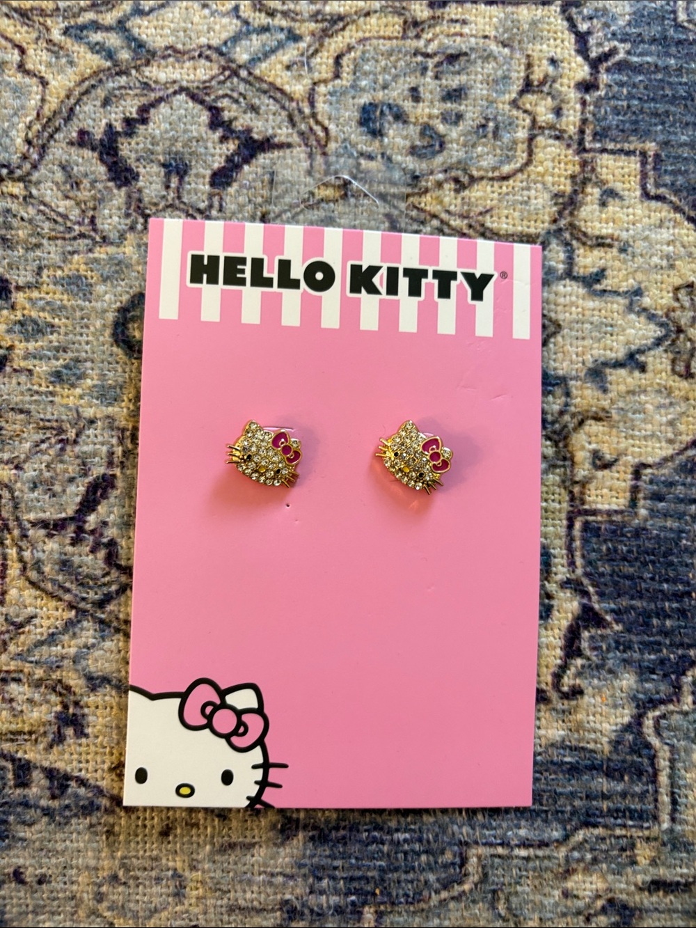 Hello Kitty Gold Tone Stud Earrings with Pink Bow Accents